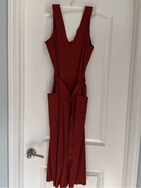 Deep V Wide-Leg Jumpsuit in Rich Brick